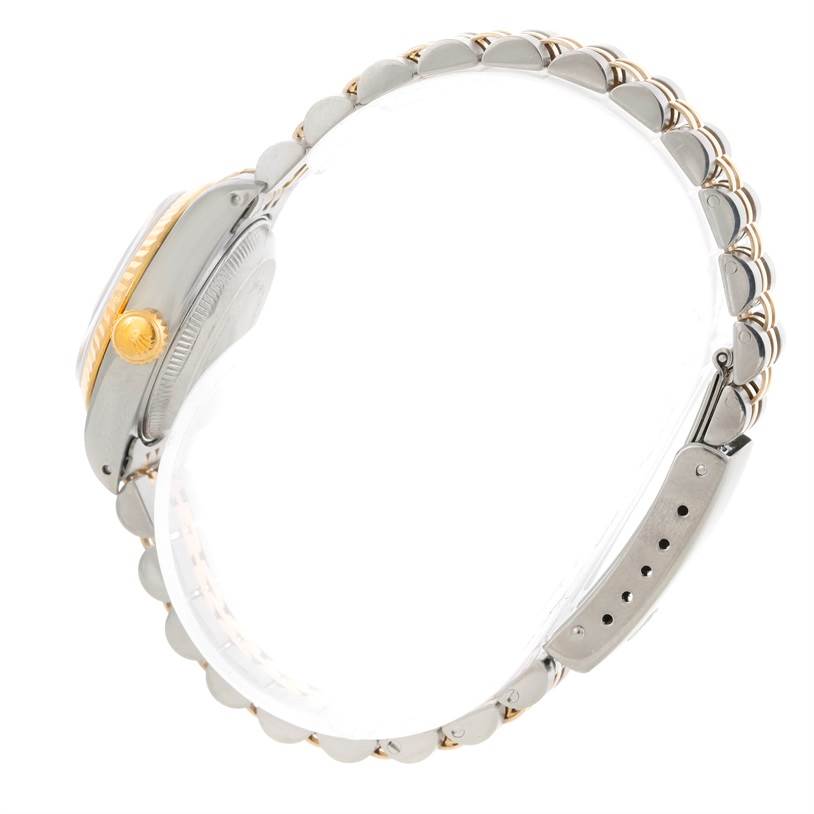 The image shows a side profile of a Rolex Datejust 69173 Women's Stainless Steel Beige Dial 69173 Women's Stainless Steel Beige Dial watch, highlighting the crown, case, and partially visible bracelet.