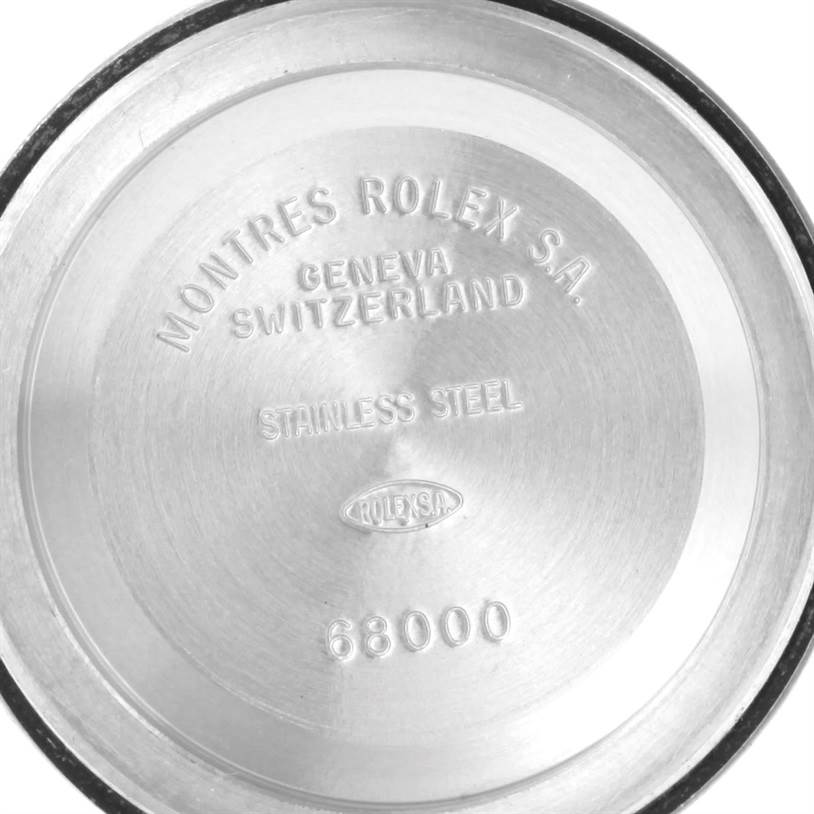 This image shows the inner case back of a Rolex Mid-Size 68240 Women's Stainless Steel Blue Dial 68240 Women's Stainless Steel Blue Dial model, displaying branding and model number 68000.