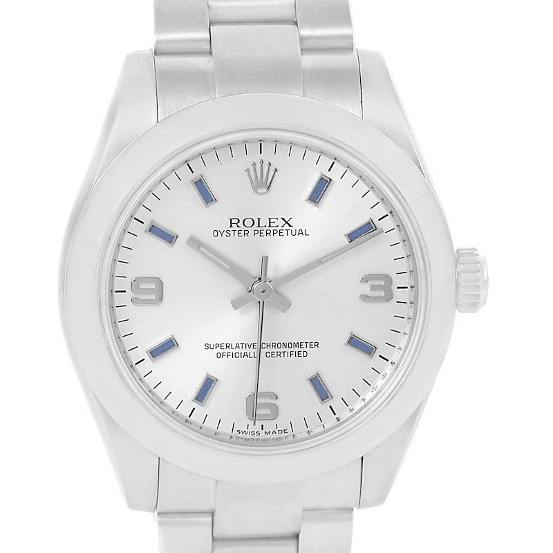 The image shows a front view of a Rolex Oyster Perpetual Mid-Size watch, highlighting its dial, hands, and bracelet.