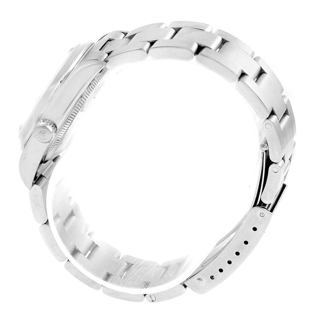 The image shows a side profile of a Mid-Size Rolex watch, highlighting the bracelet and crown.