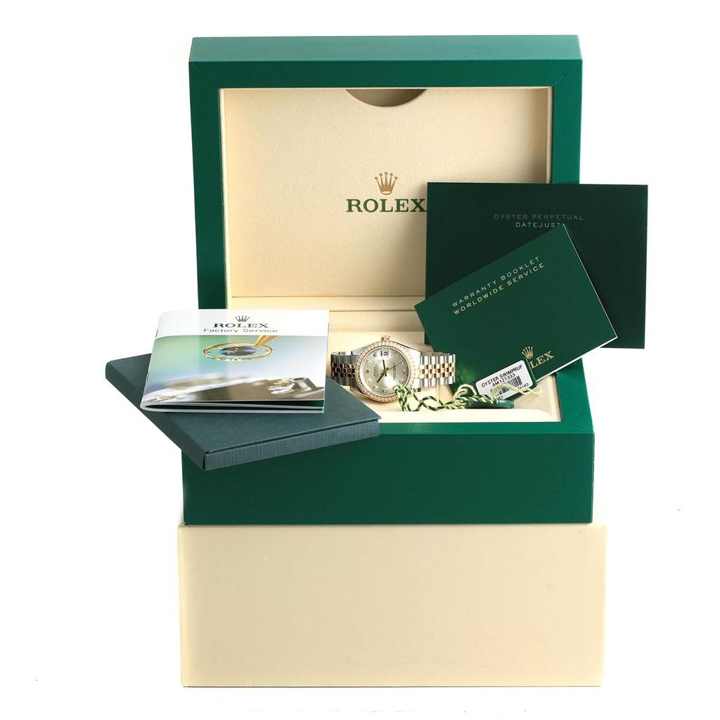The image shows a Rolex Mid-Size 178383 Women's Steel and Gold (two tone) Silver Dial 178383 Women's Steel and Gold (two tone) Silver Dial model watch in its original packaging, including manuals and a warranty booklet.