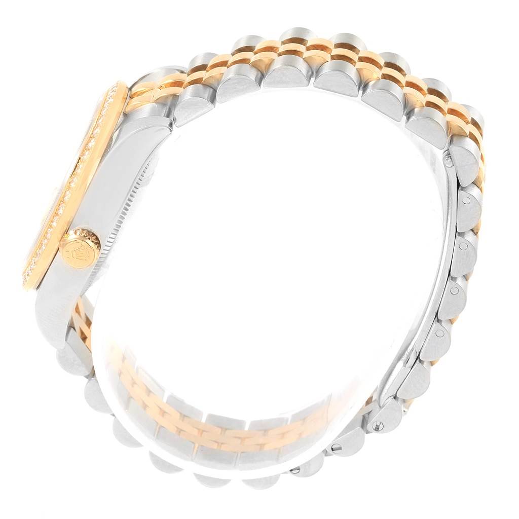 The image shows a side angle of a Rolex Mid-Size 178383 Women's Steel and Gold (two tone) Silver Dial 178383 Women's Steel and Gold (two tone) Silver Dial watch with a metal and gold-tone Jubilee bracelet and crown.