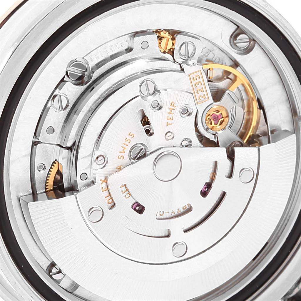 The image shows the detailed internal mechanism of a Rolex Mid-Size 178344 Women's Stainless Steel Purple Dial 178344 Women's Stainless Steel Purple Dial watch, viewed from the caseback.