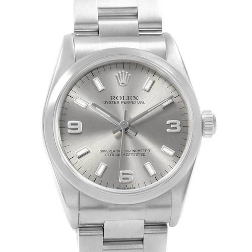 The Rolex Mid-Size 77080 Women's Stainless Steel Silver Dial 77080 Women's Stainless Steel Silver Dial watch is shown from a front angle, displaying its silver dial, hands, markers, and bracelet.