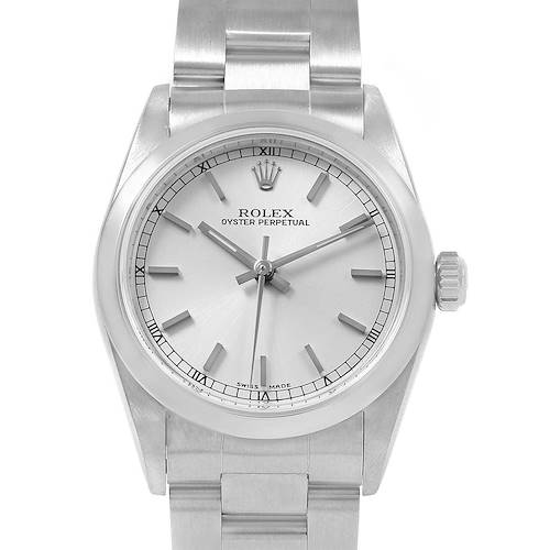 The Rolex Oyster Perpetual Mid-Size watch is shown from a front angle, displaying its dial, crown, and bracelet.