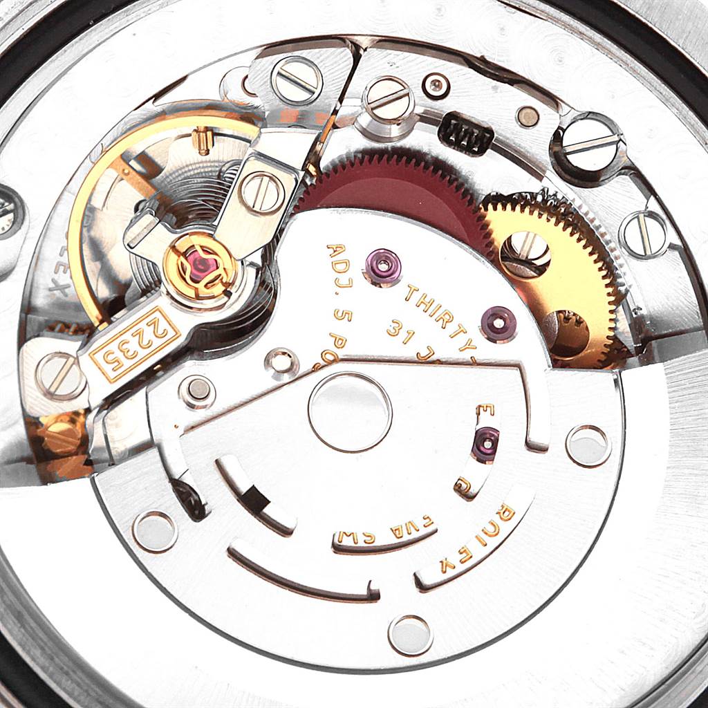 The image shows a close-up of the internal movement parts of a Rolex Mid-Size 178344 Women's Stainless Steel Brown Dial 178344 Women's Stainless Steel Brown Dial model watch.