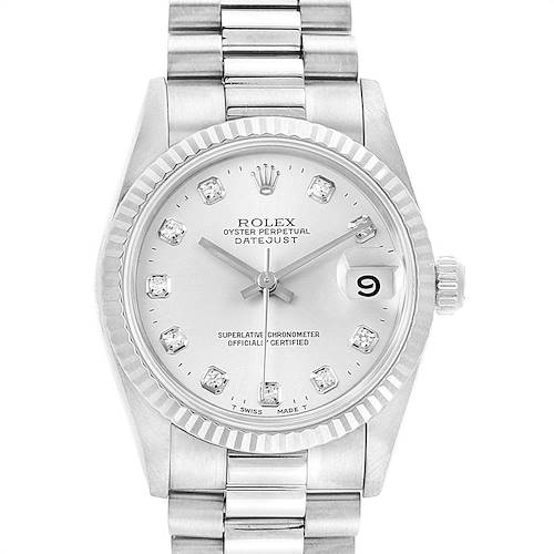 This Rolex Mid-Size 68279 Women's White Gold Silver Dial 68279 Women's White Gold Silver Dial Oyster Perpetual Datejust watch is shown from a top-down angle, highlighting the dial, bezel, and bracelet.