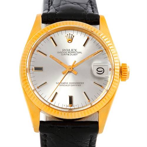 The image shows a front view of the Rolex Mid-Size 6827 Women's Yellow Gold Silver Dial 6827 Women's Yellow Gold Silver Dial Oyster Perpetual Datejust watch with a gold bezel and a black leather strap.