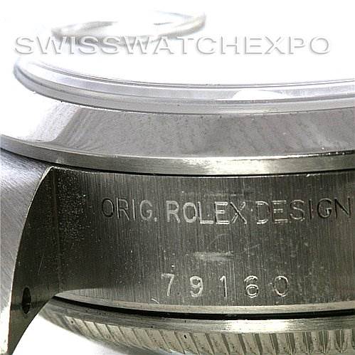 This image shows a close-up of the side of a Rolex Date 79160 Women's Stainless Steel White Dial 79160 Women's Stainless Steel White Dial model watch, revealing the case with engravings "Orig. Rolex Design" and "79160."