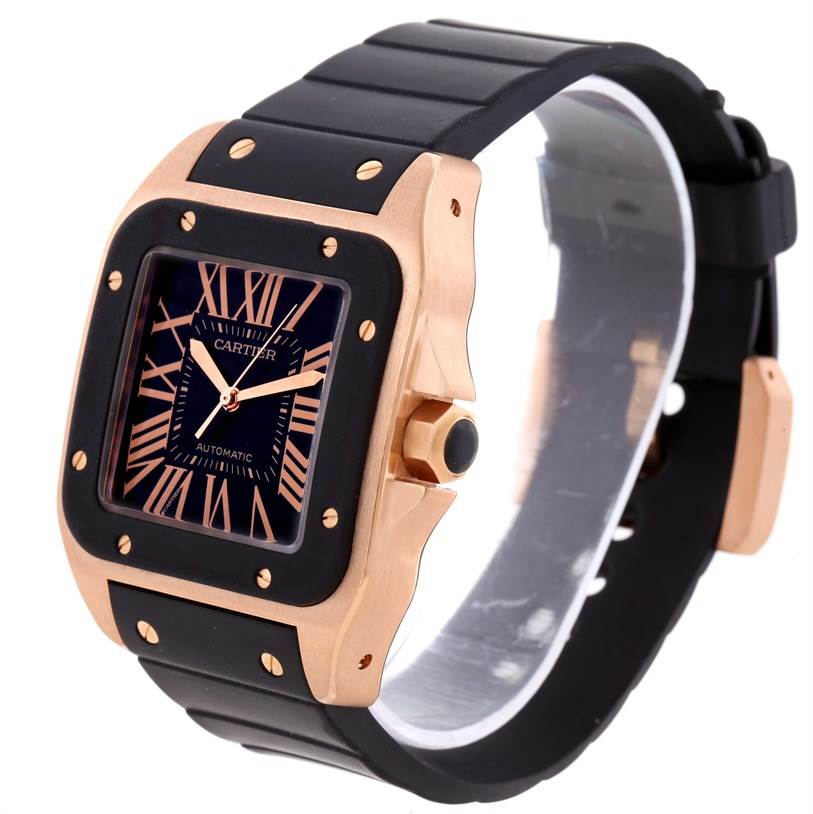 The Cartier Santos W20124U2 Men's Rose Gold Black Dial W20124U2 Men's Rose Gold Black Dial watch is shown at an angle displaying the face, bezel, and black rubber strap.