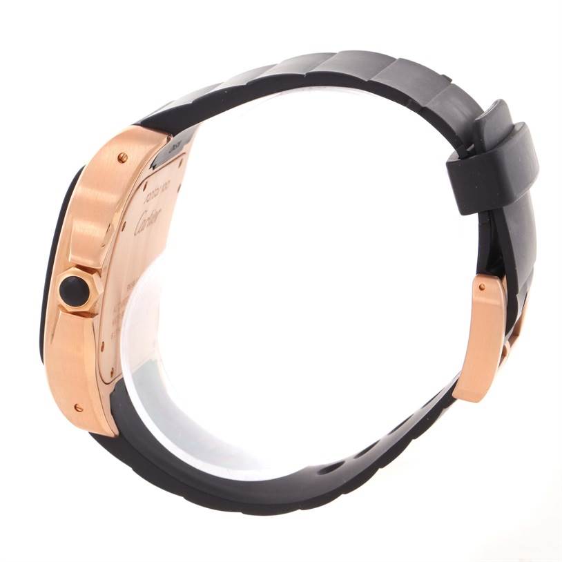 The image shows a side view of the Cartier Santos W20124U2 Men's Rose Gold Black Dial W20124U2 Men's Rose Gold Black Dial watch, highlighting its case back and black strap.