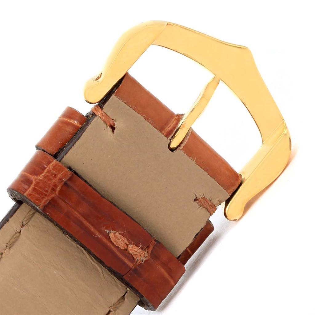 The image shows the buckle and leather strap of the Cartier Tank Louis W1529756 Men's Yellow Gold Silver Dial W1529756 Men's Yellow Gold Silver Dial watch, viewed from the top.