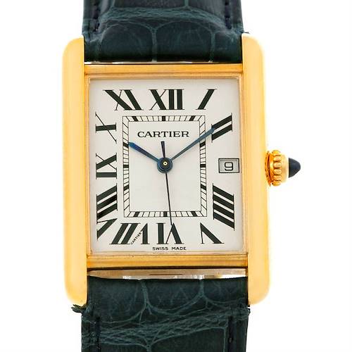 The image shows a front view of the Tank Louis model by Cartier, featuring its face, hands, crown, and part of the strap.