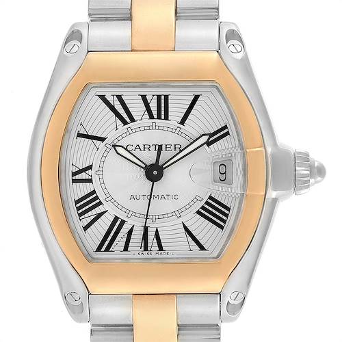This image shows a close-up of the face of a Cartier Roadster W62031Y4 Men's Steel and Gold (two tone) Silver Dial W62031Y4 Men's Steel and Gold (two tone) Silver Dial model watch, highlighting its dial, hands, date window, and part of the band.