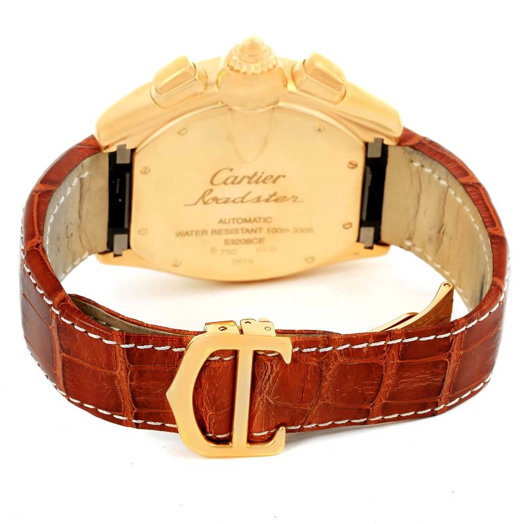 The image shows the back view of a Cartier Roadster W62021Y3 Men's Yellow Gold Champagne Dial W62021Y3 Men's Yellow Gold Champagne Dial watch, highlighting the case back, leather strap, and clasp.