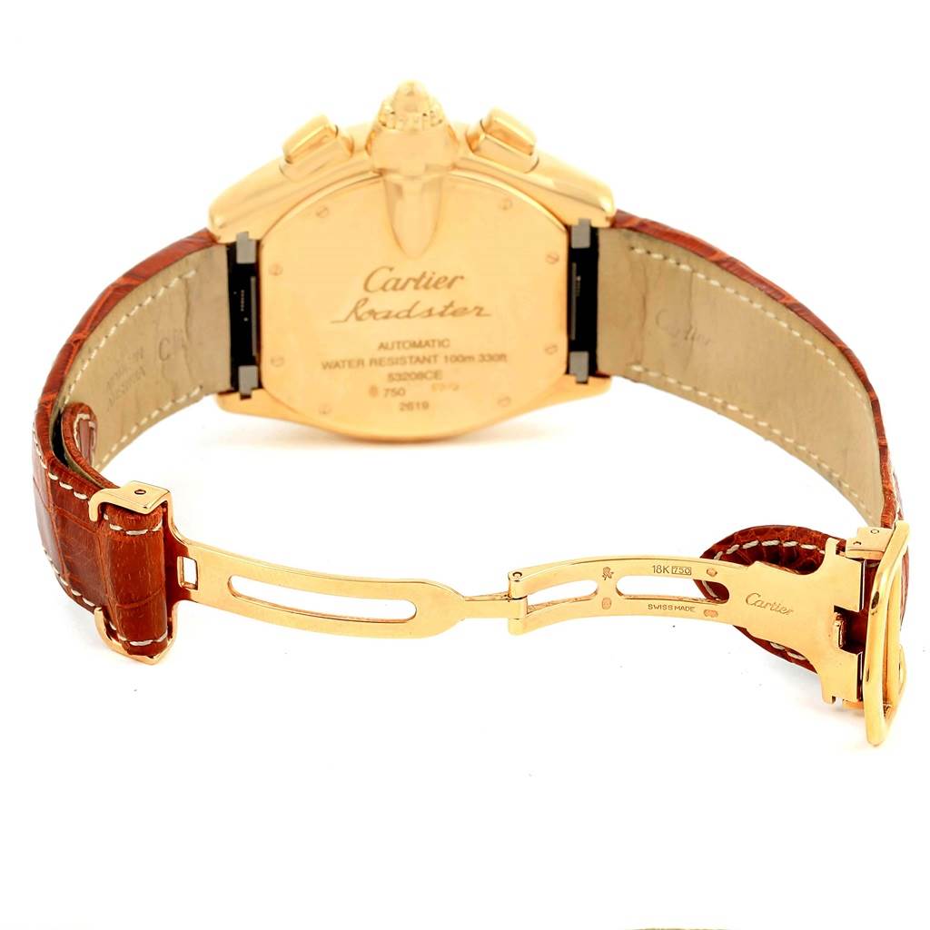The image shows the back view of the Cartier Roadster W62021Y3 Men's Yellow Gold Champagne Dial W62021Y3 Men's Yellow Gold Champagne Dial watch, highlighting its caseback and brown leather strap with gold clasp.