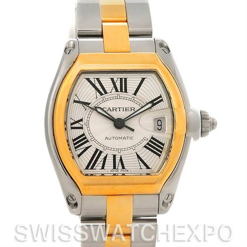 The Cartier Roadster W62031Y4 Men's Steel and Gold (two tone) Silver Dial W62031Y4 Men's Steel and Gold (two tone) Silver Dial watch is shown from a front angle, displaying the face, bezel, and part of the bracelet.
