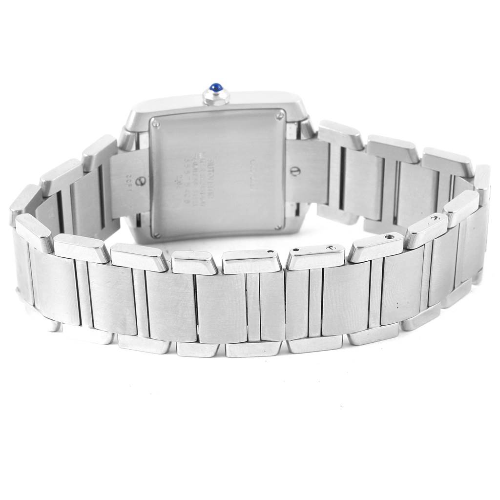 The image shows the back view of a Cartier Tank Francaise W51002Q3 Men's Stainless Steel Silver Dial W51002Q3 Men's Stainless Steel Silver Dial watch, highlighting the bracelet and case back.