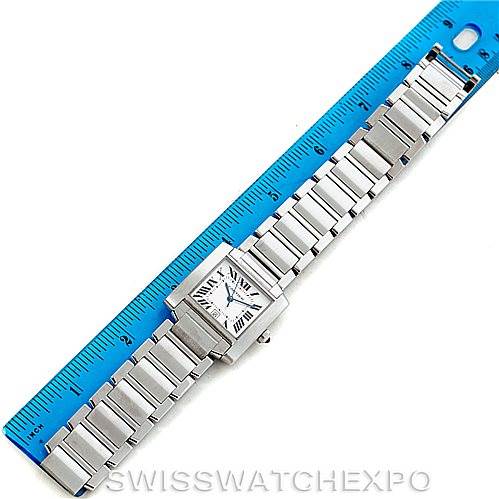 The Cartier Tank Francaise W51002Q3 Men's Stainless Steel Silver Dial W51002Q3 Men's Stainless Steel Silver Dial watch is shown flat with its full metal bracelet and a blue ruler measuring its length.
