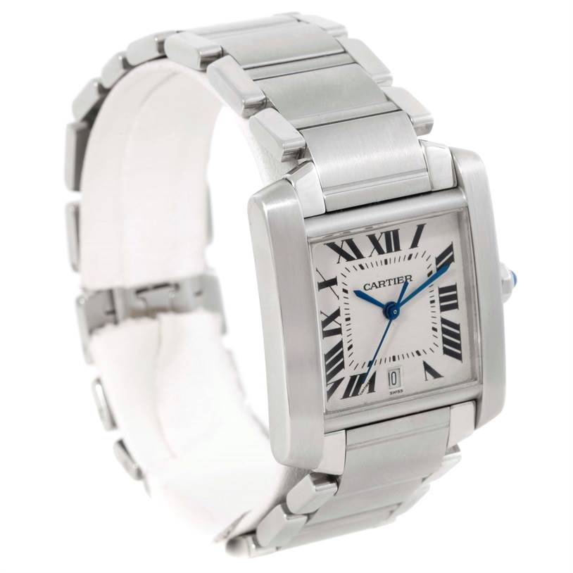 The image shows a three-quarter angle view of the Cartier Tank Française watch, featuring its silver bracelet and rectangular face with Roman numerals.