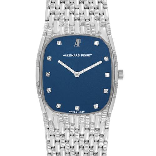The Audemars Piguet Vintage Men's White Gold Blue Dial Men's White Gold Blue Dial watch is shown from a front angle, highlighting its blue dial, silver markers, and intricate metal bracelet.