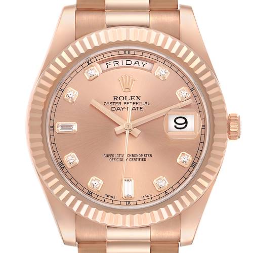 The image shows a frontal close-up of the Rolex President 218235 Men's Rose Gold Pink Dial 218235 Men's Rose Gold Pink Dial model, highlighting the dial, fluted bezel, and part of the bracelet.