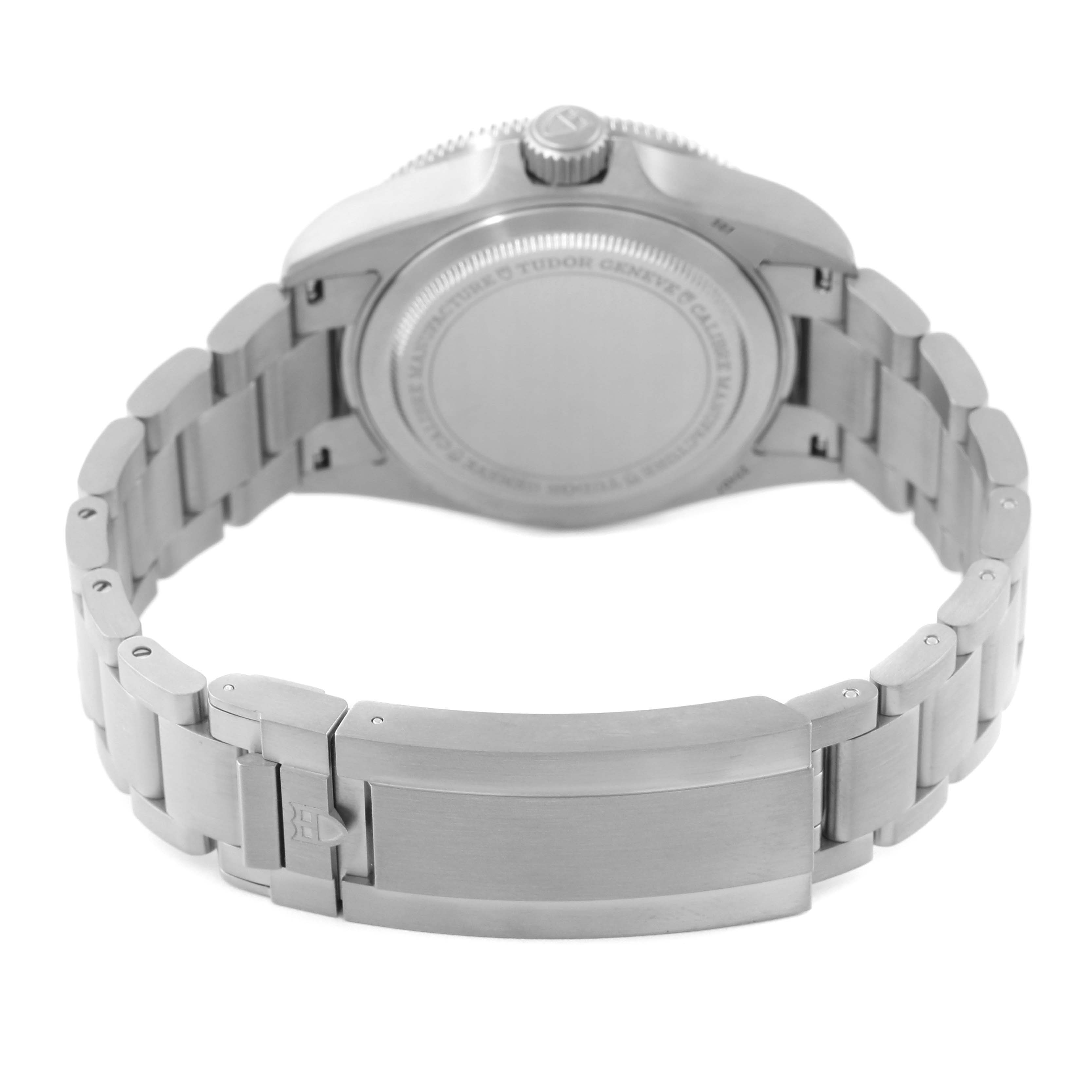 This image shows the backside of a Tudor Pelagos 25407N Men's Titanium Black Dial 25407N Men's Titanium Black Dial watch, highlighting the case back, crown, and metal bracelet with clasp.