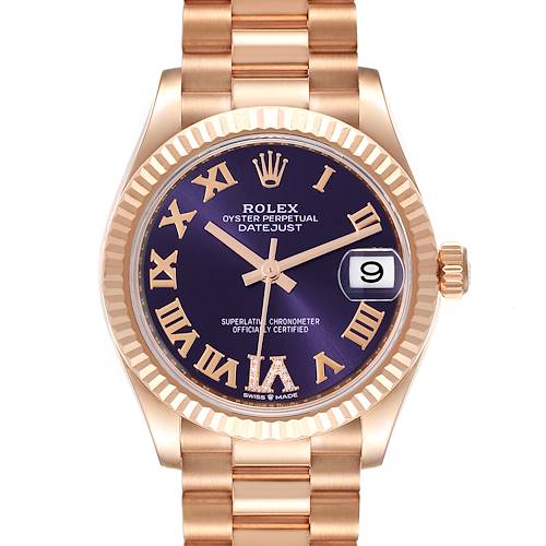 This is a close-up view of the dial and bracelet of a Rolex President 278275 Women's Rose Gold Blue Dial 278275 Women's Rose Gold Blue Dial model watch, highlighting its gold finish and purple face.