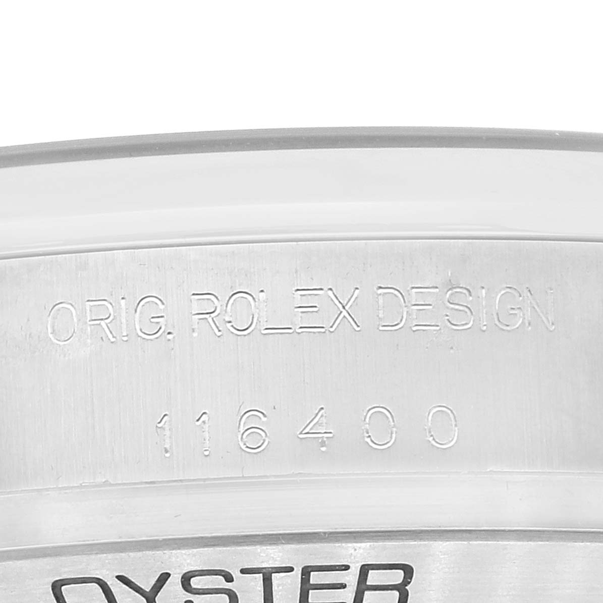 This close-up image shows the side of the case back of a Rolex Milgauss 116400 Men's Stainless Steel White Dial 116400 Men's Stainless Steel White Dial, displaying its model and design engravings.