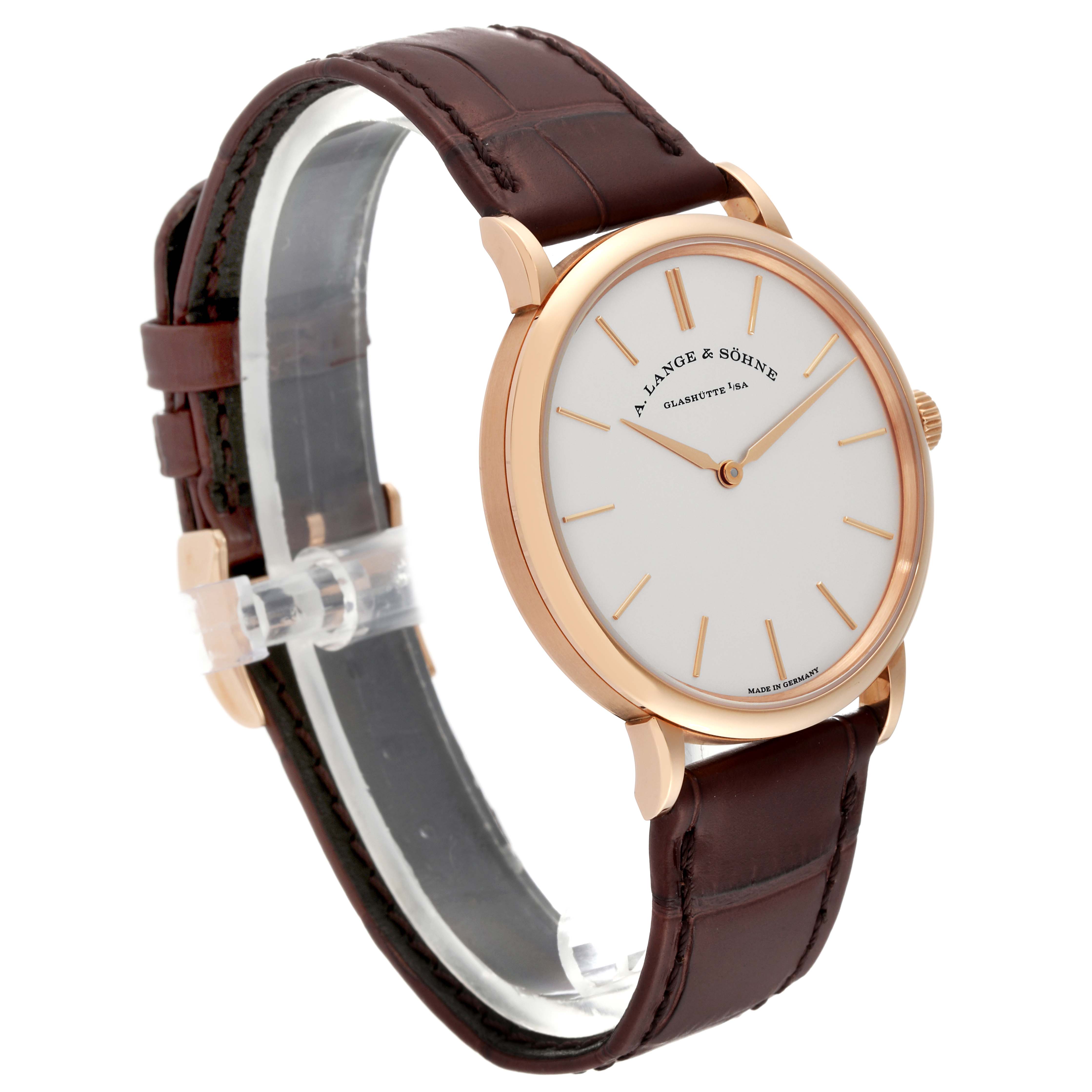 The image shows a side angle view of the A. Lange & Sohne Saxonia 201.033 Men's Rose Gold Silver Dial watch, highlighting its face, case, and leather strap.