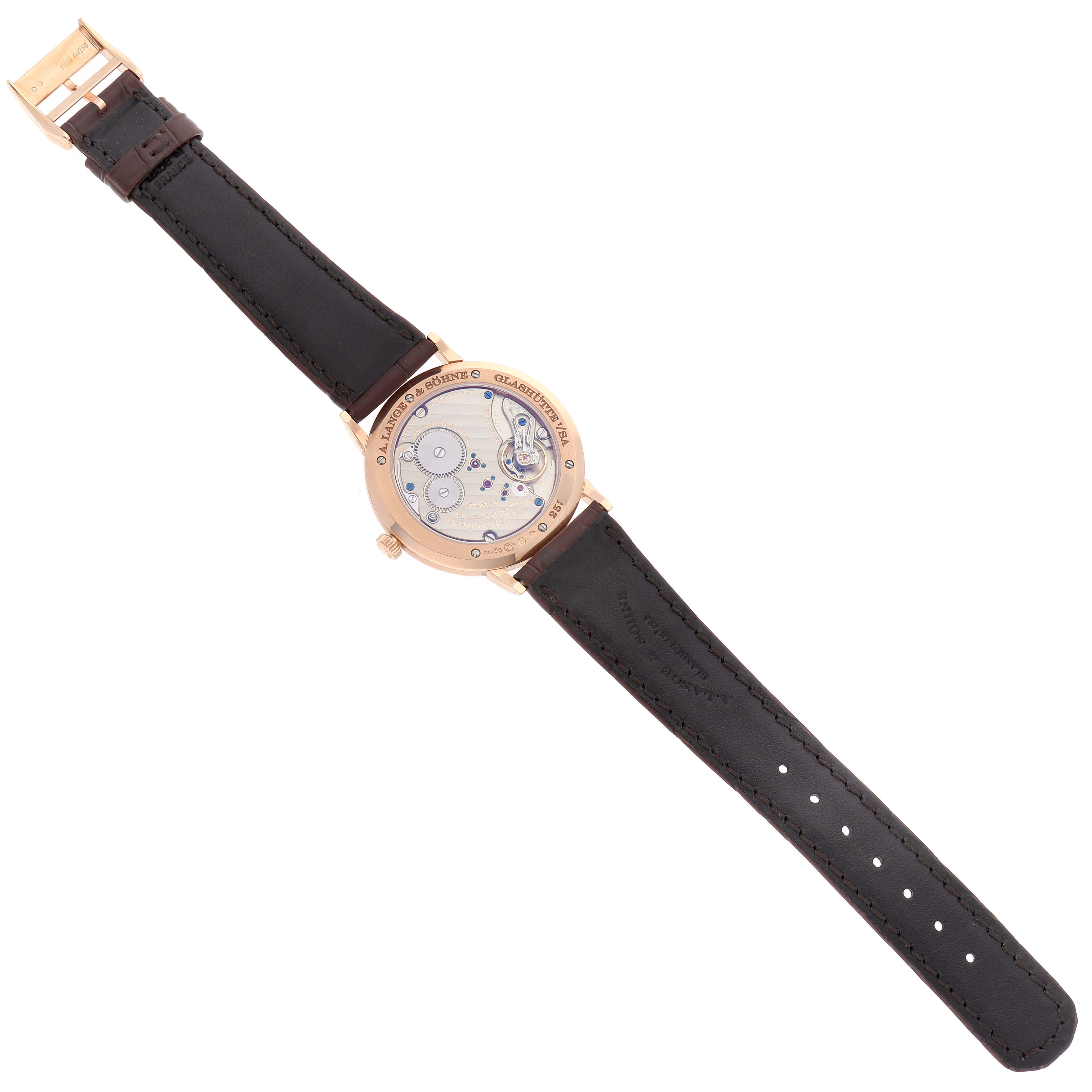 The image shows the reverse side of the A. Lange & Sohne Saxonia watch, highlighting the movement and leather strap.