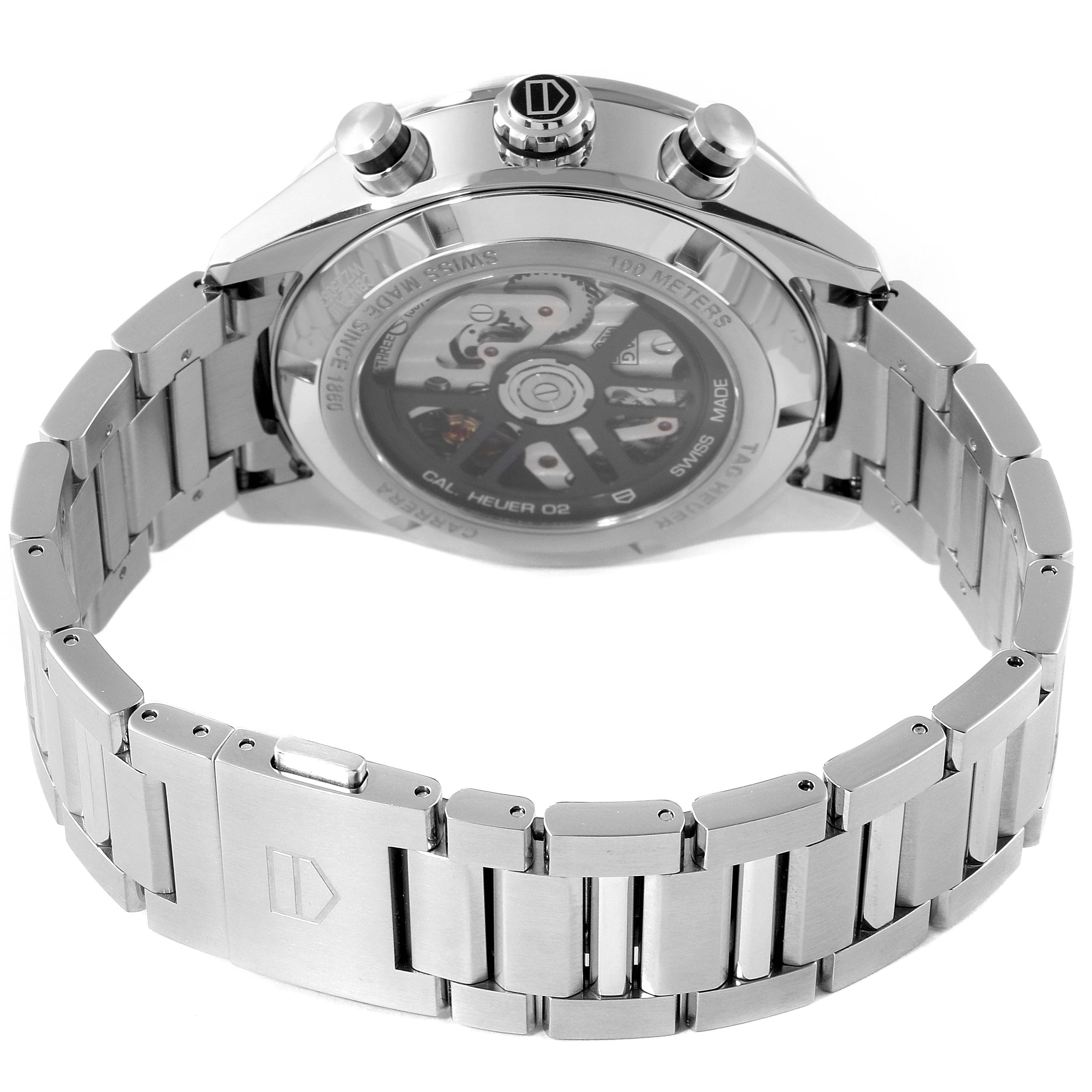 The image shows the back and bracelet of a Tag Heuer Carrera CBN2A10.BA0643 Men's Stainless Steel Green Dial CBN2A10.BA0643 Men's Stainless Steel Green Dial watch, highlighting its stainless steel construction and transparent case back.