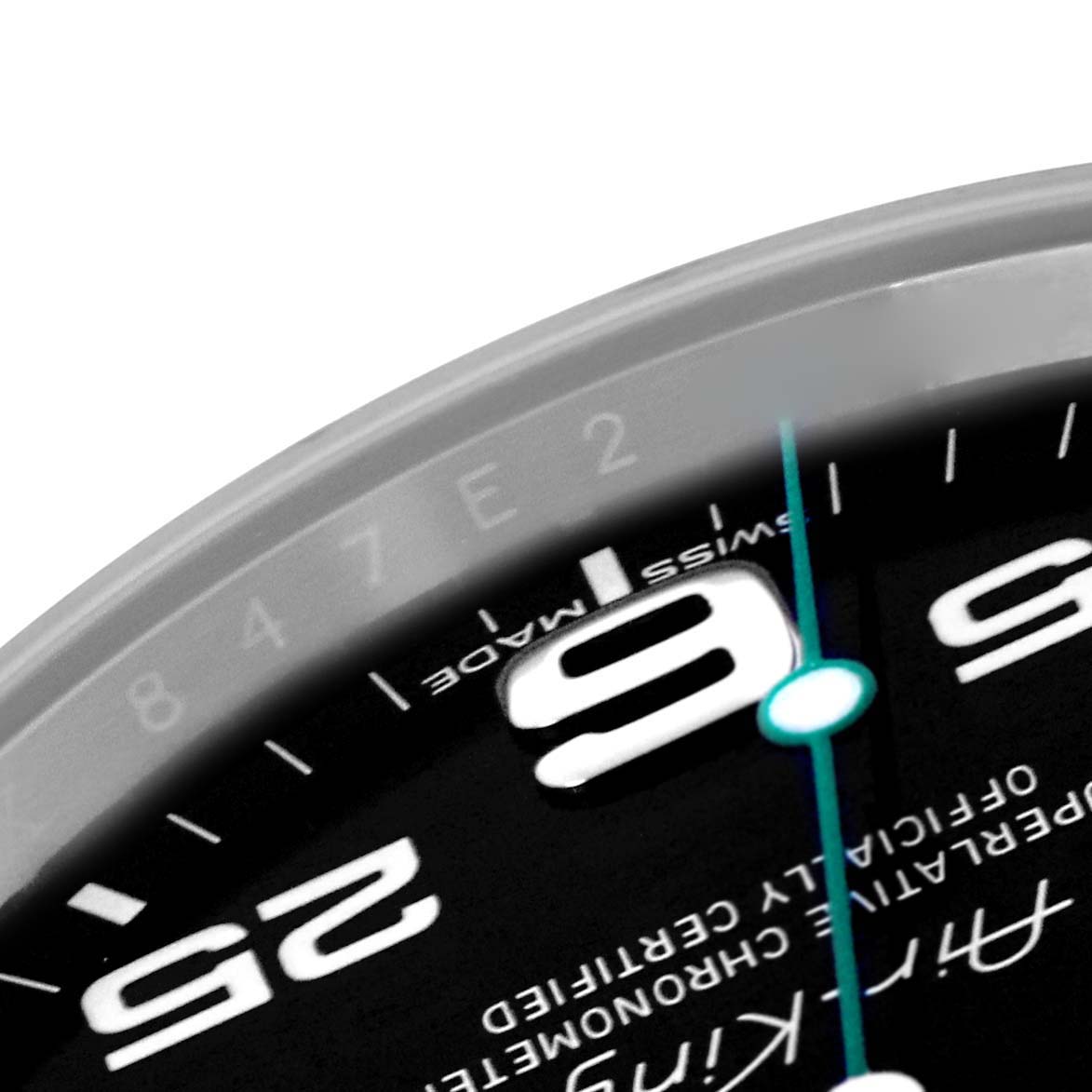 This image shows a close-up of the Rolex Air-King 116900 Men's Stainless Steel Black Dial 116900 Men's Stainless Steel Black Dial watch, focusing on part of the dial with numerals and the minute hand.