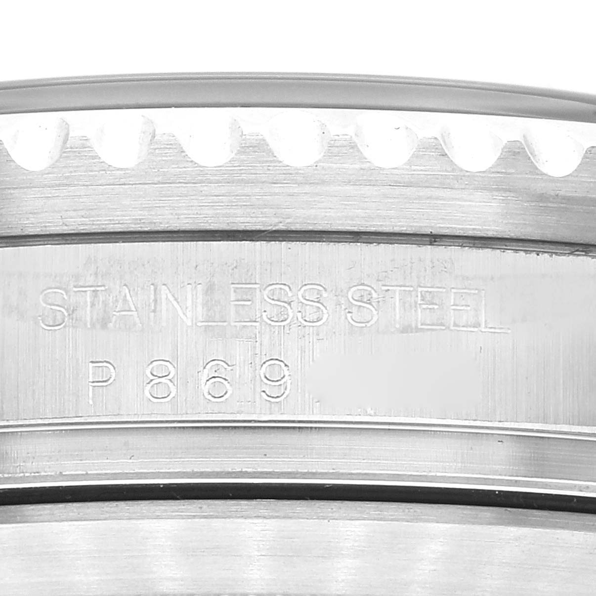 This close-up image shows the engraving on the stainless steel case back of a Rolex Sea-Dweller 16600 Men's Stainless Steel Black Dial 16600 Men's Stainless Steel Black Dial watch.