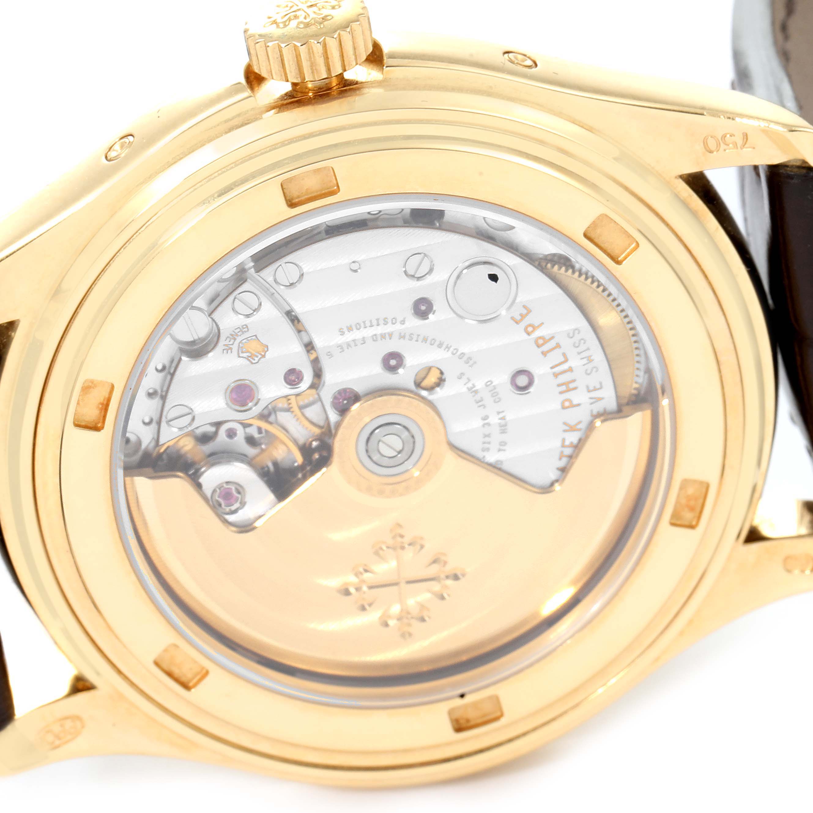 The image shows the case back and internal movement of the Patek Philippe 5146J - 01D Men's Yellow Gold Grey Dial 5146J - 01D Men's Yellow Gold Grey Dial Complicated Annual Calendar Yellow Gold Mens Watch 5146.