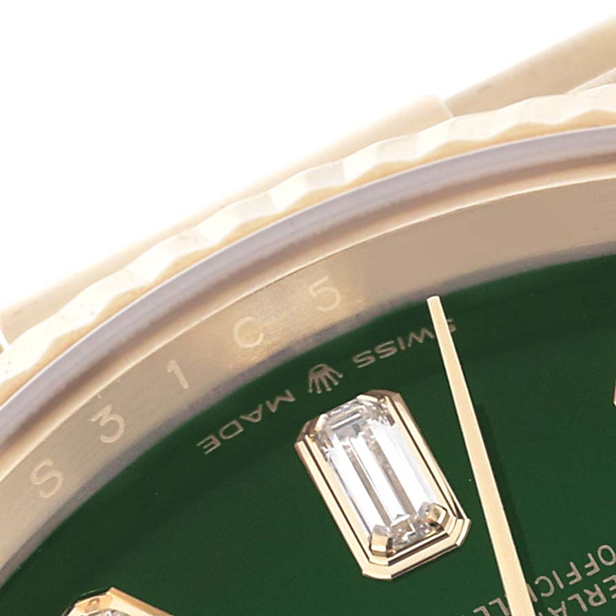 Close-up view of the Rolex President 128238 Men's Yellow Gold Green Dial 128238 Men's Yellow Gold Green Dial model showing a portion of the bezel, dial with diamond markers, and hands.