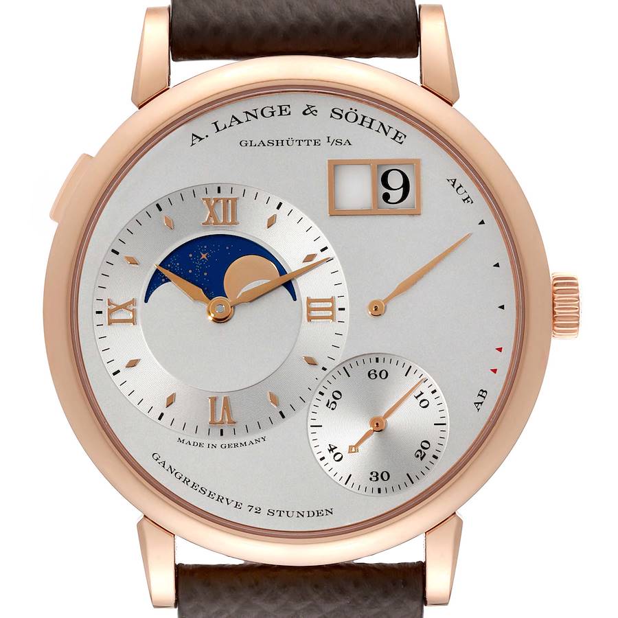 The image shows a front view of the Lange 1 model by A. Lange & Söhne, featuring a moonphase, date display, and power reserve indicator.