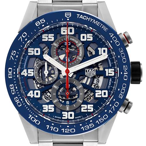 The image shows a frontal view of the Tag Heuer Carrera CAR2A1K.BA0703 Men's Stainless Steel Blue Dial CAR2A1K.BA0703 Men's Stainless Steel Blue Dial watch, highlighting its dial, tachymeter, and sub-dials.