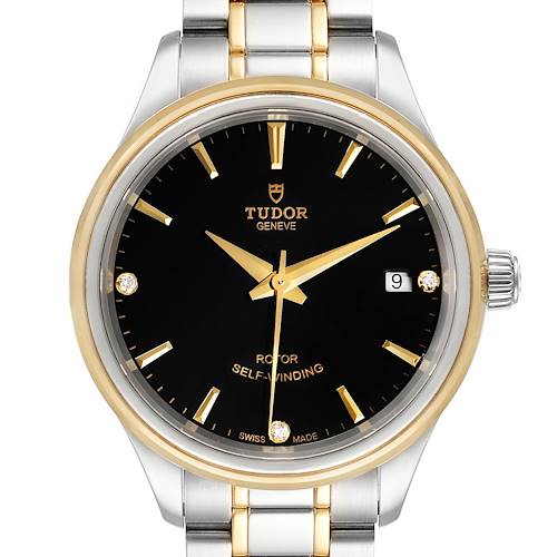 The Tudor Style M12303 Women's Steel and Gold (two tone) Black Dial M12303 Women's Steel and Gold (two tone) Black Dial model watch is shown from a front angle, highlighting its black dial, gold accents, and stainless steel bracelet.