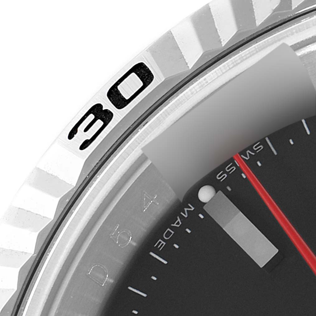 The image shows a close-up of the bezel and part of the dial of a Rolex Turn-o-Graph 116264 Men's Stainless Steel Black Dial 116264 Men's Stainless Steel Black Dial watch.