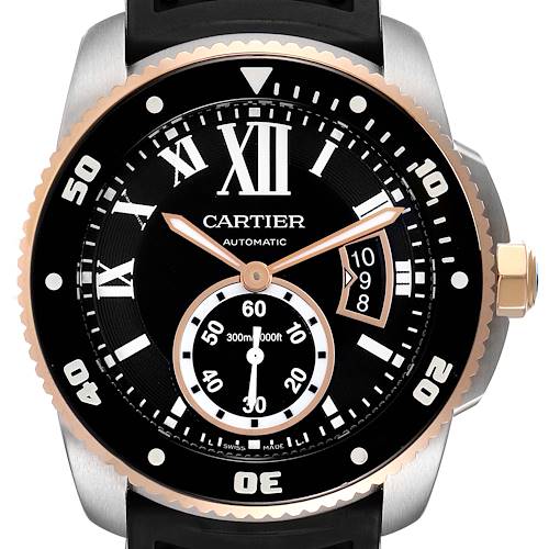 The image displays a close-up, front angle of the Calibre de Cartier watch by Cartier, showing the dial and bezel details.