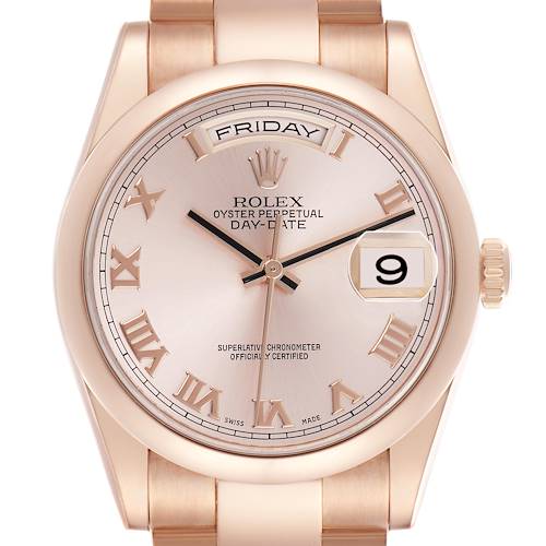 The Rolex President 118205 Men's Rose Gold Pink Dial 118205 Men's Rose Gold Pink Dial model watch is shown from a frontal angle, highlighting the dial, day, date window, and crown.