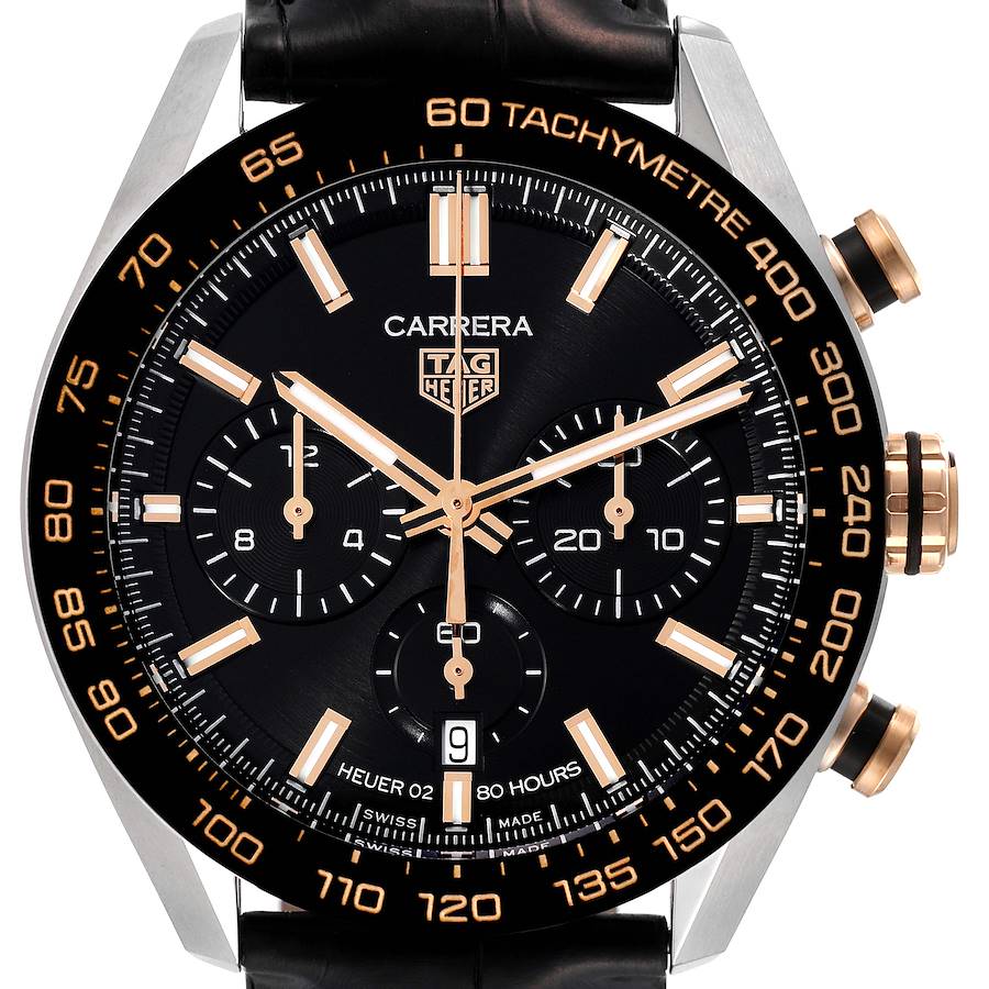 This image shows a close-up of the Tag Heuer Carrera CBN2A5A.FC6481 Men's Steel and Gold (two tone) Black Dial CBN2A5A.FC6481 Men's Steel and Gold (two tone) Black Dial watch face, highlighting the tachymeter, sub-dials, hands, and date window.