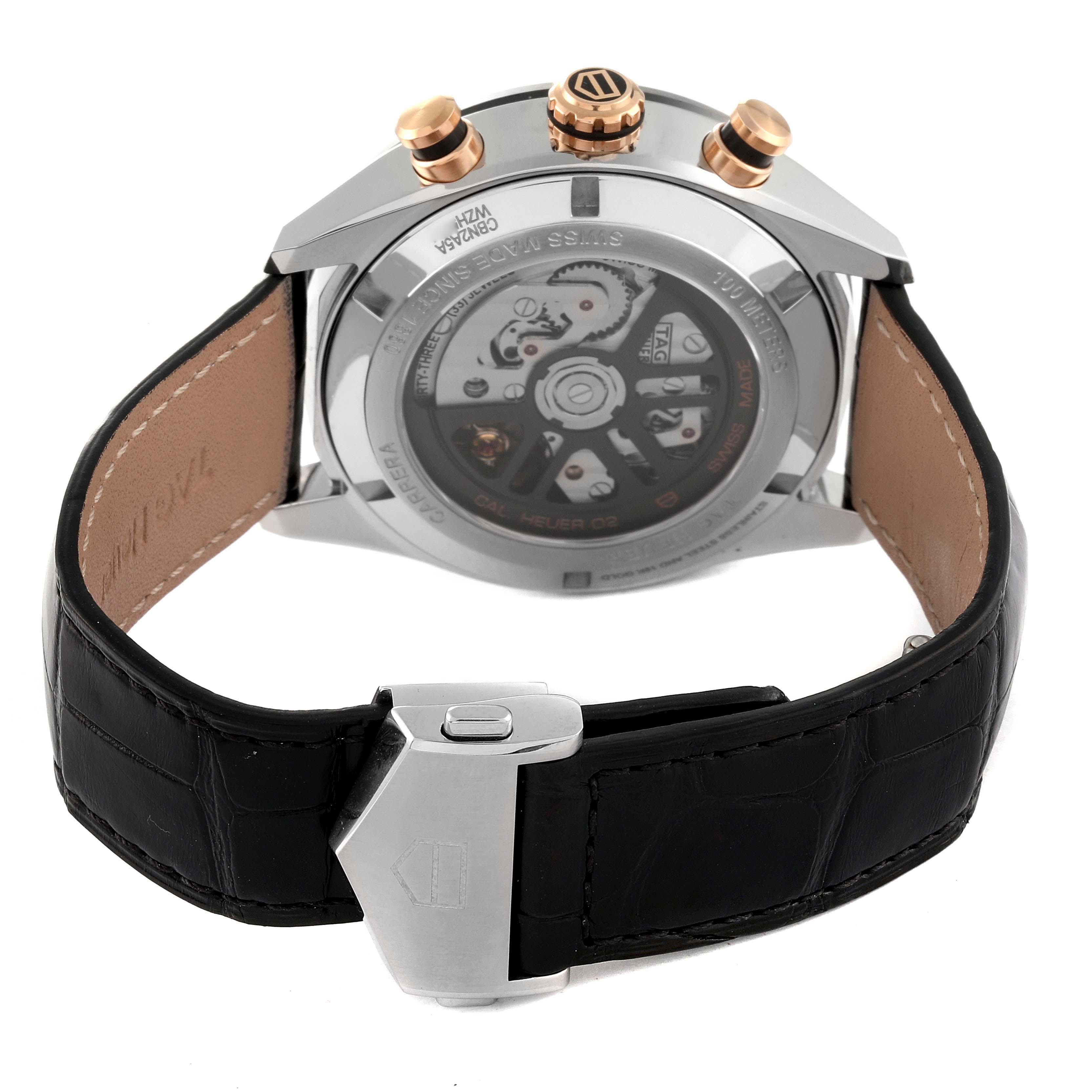 The image shows the back view of the Tag Heuer Carrera CBN2A5A.FC6481 Men's Steel and Gold (two tone) Black Dial CBN2A5A.FC6481 Men's Steel and Gold (two tone) Black Dial watch, highlighting its movement, pushers, and leather strap with a deployment clasp.