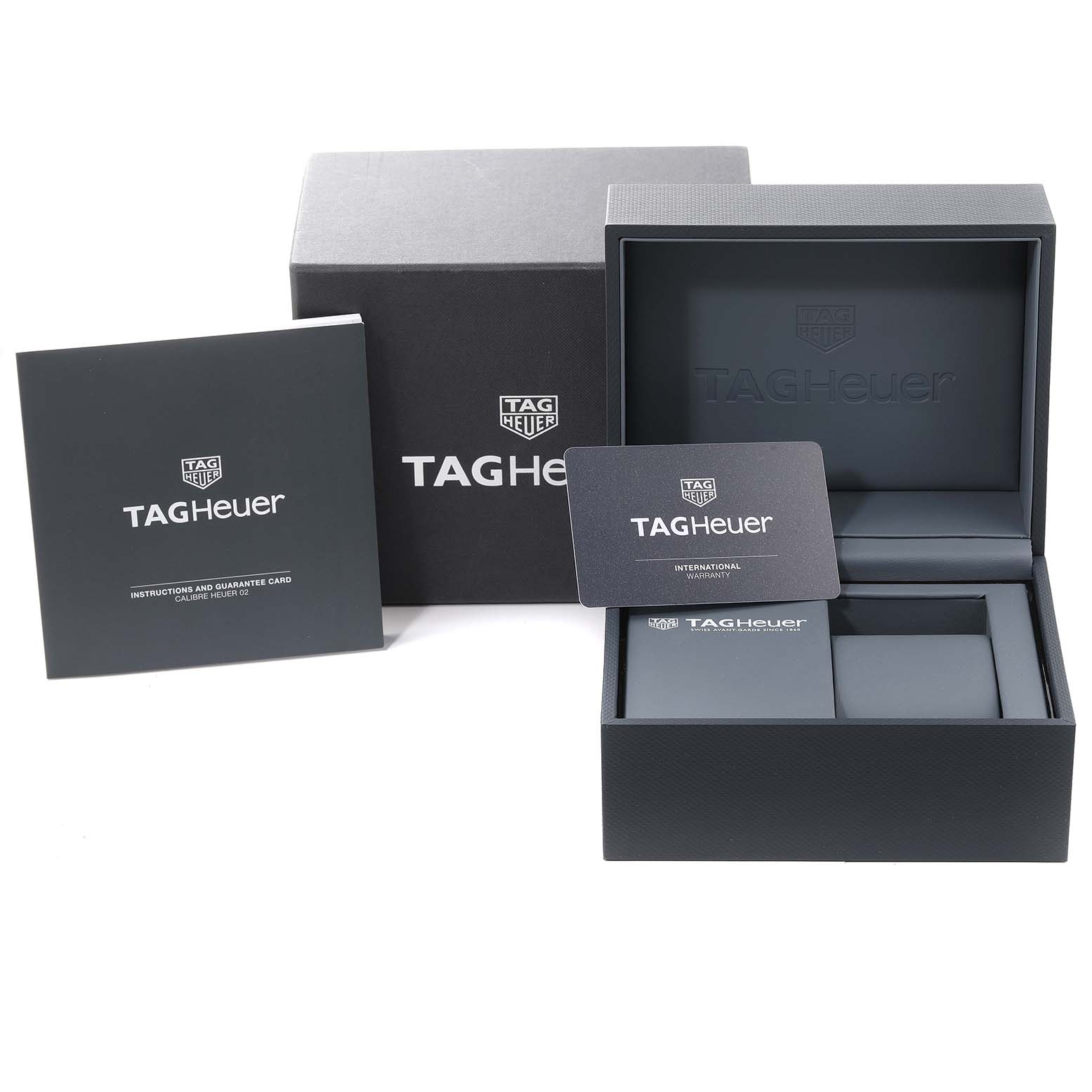 The image shows the packaging, instruction manual, and warranty card for a Tag Heuer Carrera CBN2A5A.FC6481 Men's Steel and Gold (two tone) Black Dial CBN2A5A.FC6481 Men's Steel and Gold (two tone) Black Dial watch.
