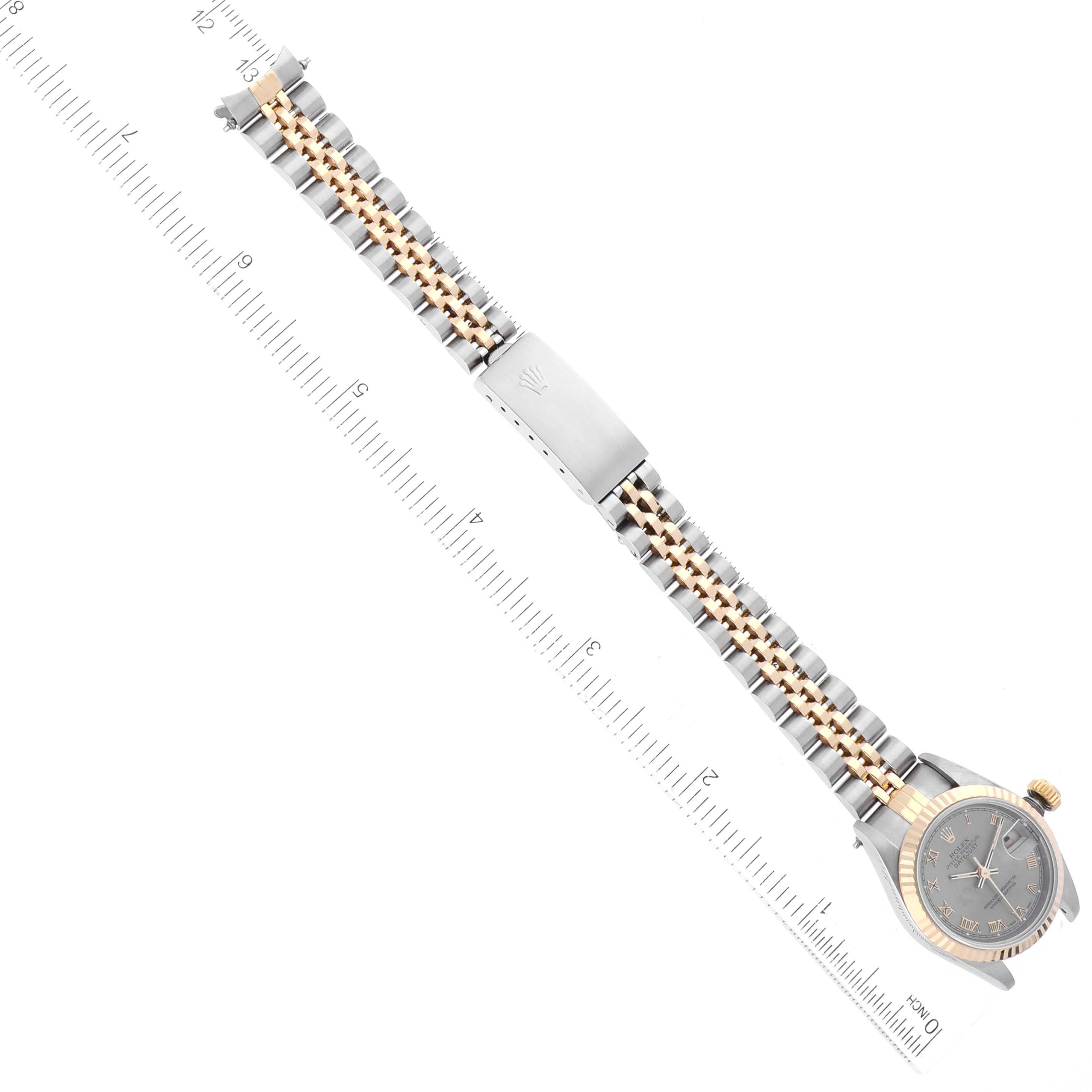 The image shows an overhead view of a Rolex Datejust 69173 Women's Steel and Gold (two tone) Grey Dial 69173 Women's Steel and Gold (two tone) Grey Dial watch, displaying the dial, bezel, crown, and bracelet alongside a ruler.