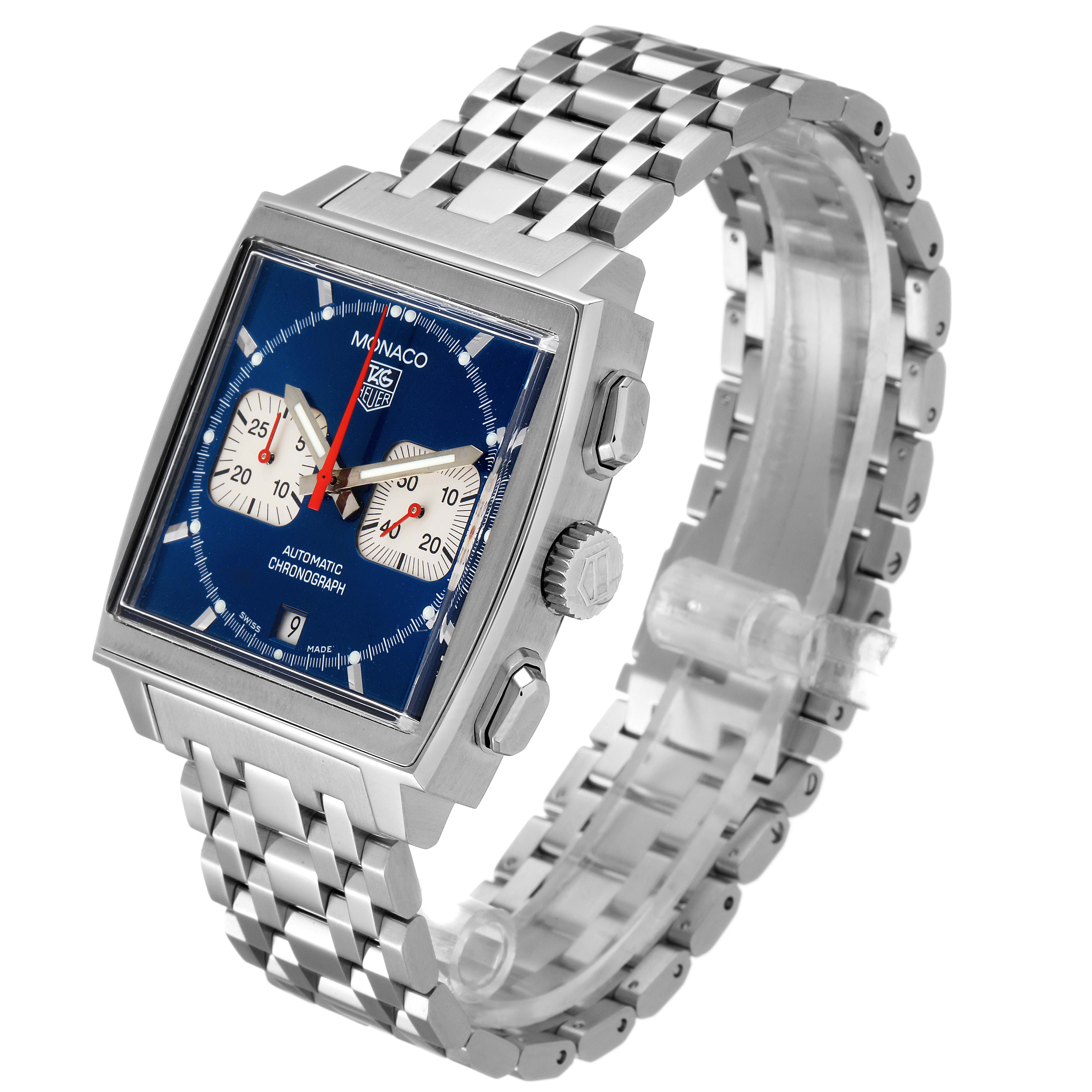 The image shows a Tag Heuer Monaco CW2113.BA0780 Men's Stainless Steel Blue Dial CW2113.BA0780 Men's Stainless Steel Blue Dial watch angled to display the face, bezel, crown, pushers, and metal bracelet.