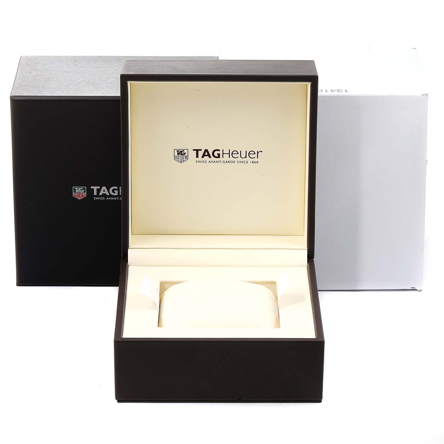 The image shows an open Tag Heuer Monaco CW2113.BA0780 Men's Stainless Steel Blue Dial CW2113.BA0780 Men's Stainless Steel Blue Dial watch box with the brand name visible inside.