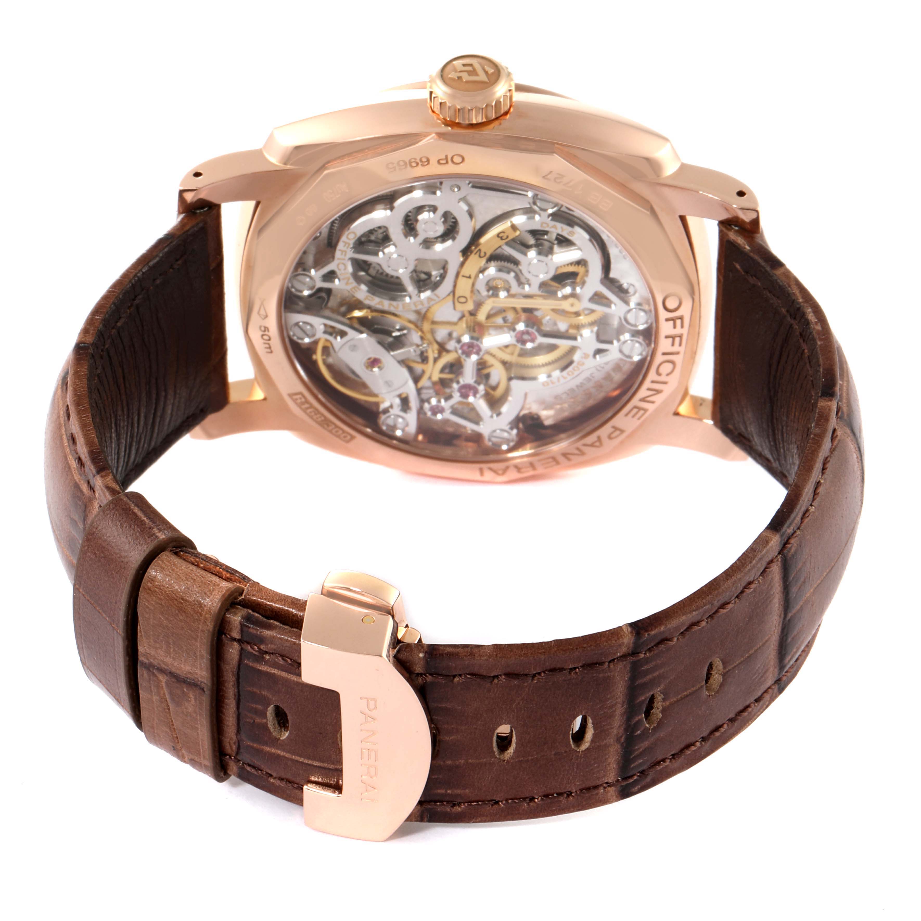 The image shows the back view of a Panerai Radiomir PAM00570 Men's Rose Gold Brown Dial PAM00570 Men's Rose Gold Brown Dial watch, highlighting the intricate mechanism and brown leather strap.