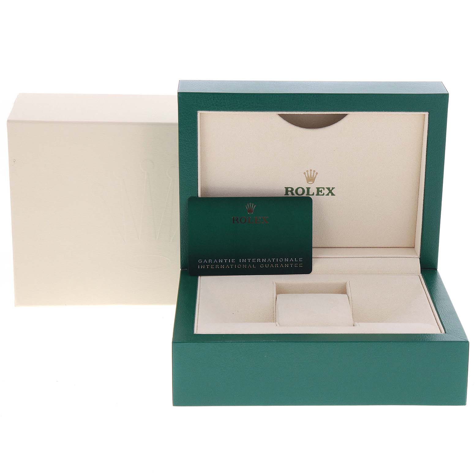 The image shows an open Rolex Datejust 126200 Men's Stainless Steel White Dial 126200 Men's Stainless Steel White Dial box with the international guarantee card placed inside.